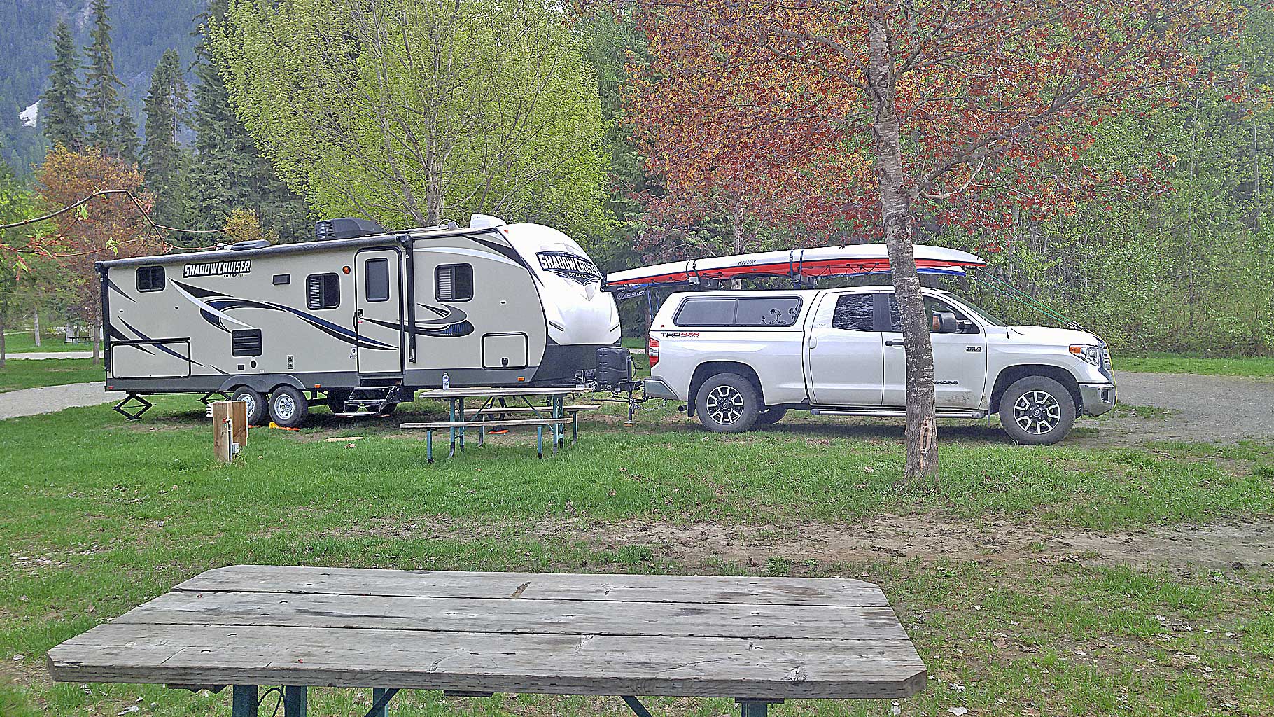 Casper (truck) and Clark (camper) pose